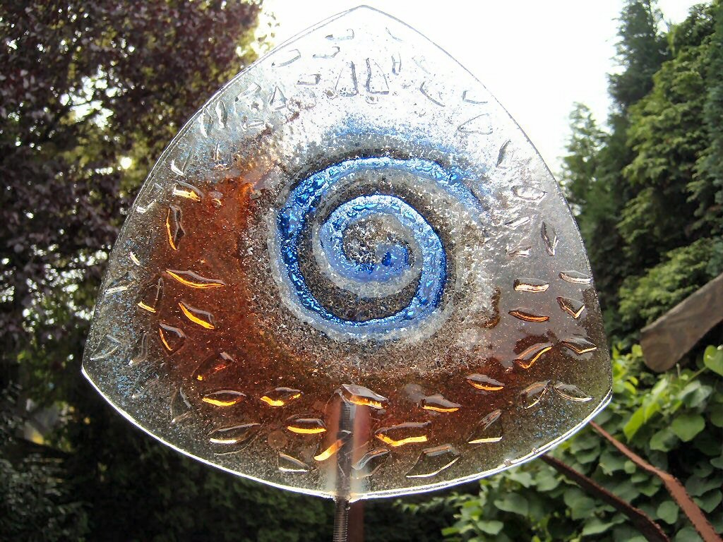 As in Glas.
